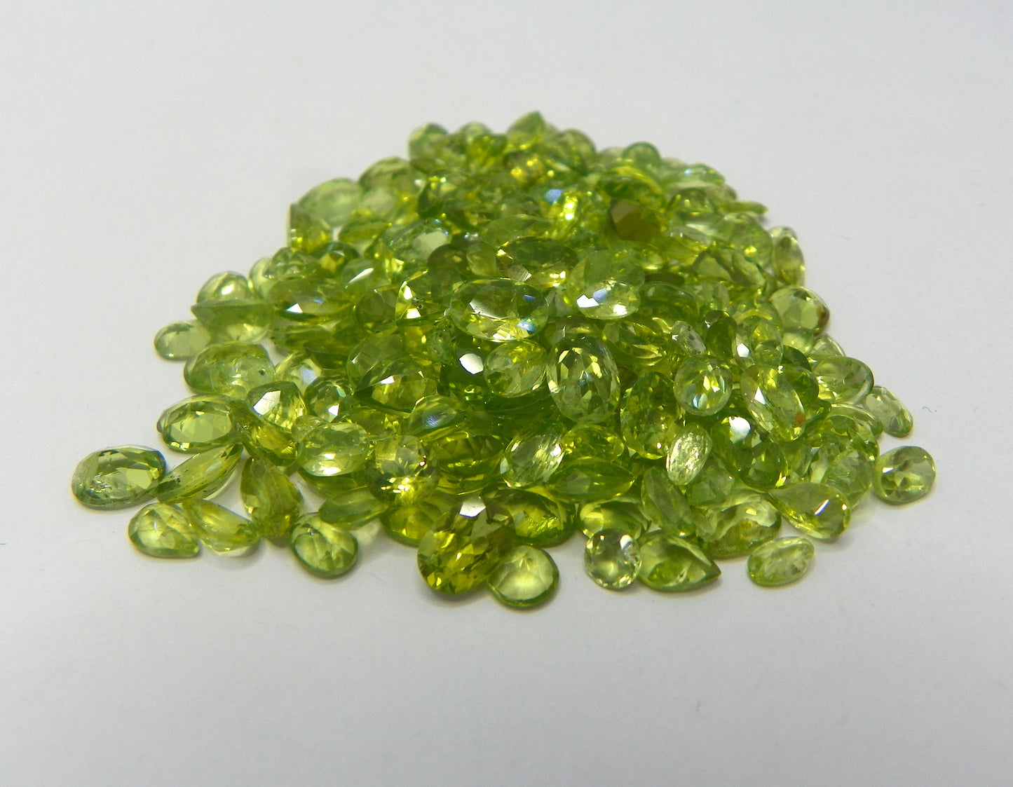 Natural Peridot Lot 102.48 ct. IF Clarity, Transparent, Not Enhanced with Very Good Cut Grade