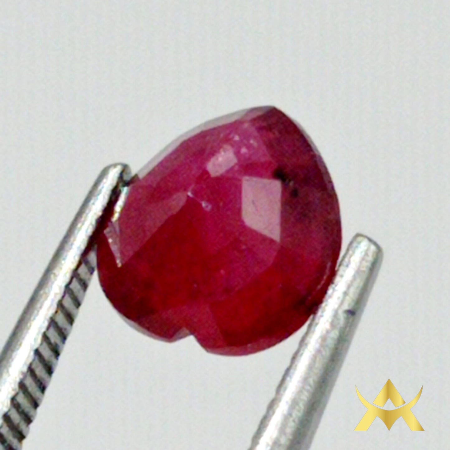 Ruby Heart Cut, Transparent with SI1 Clarity and Very Good cut Grade