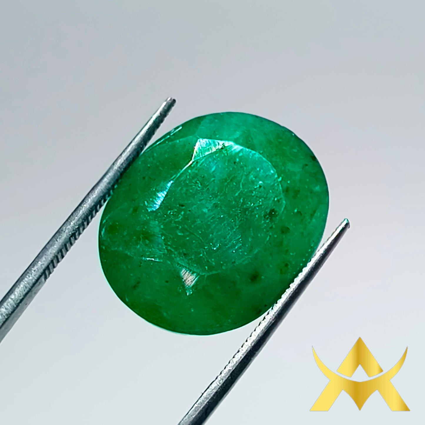 Natural Emerald 14.43 ct. Semi Translucent and Not Enhanced with Excellent Cut Grade