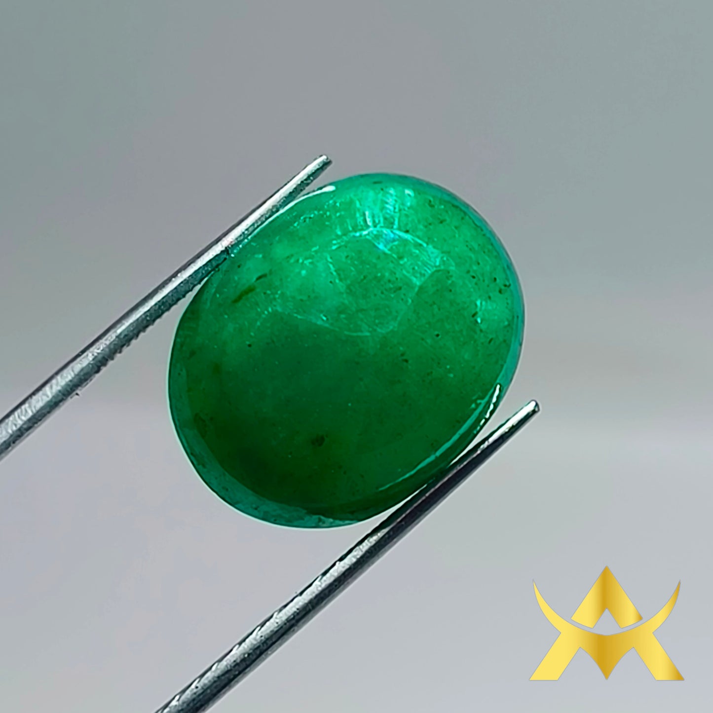 Natural Emerald 14.43 ct. Semi Translucent and Not Enhanced with Excellent Cut Grade