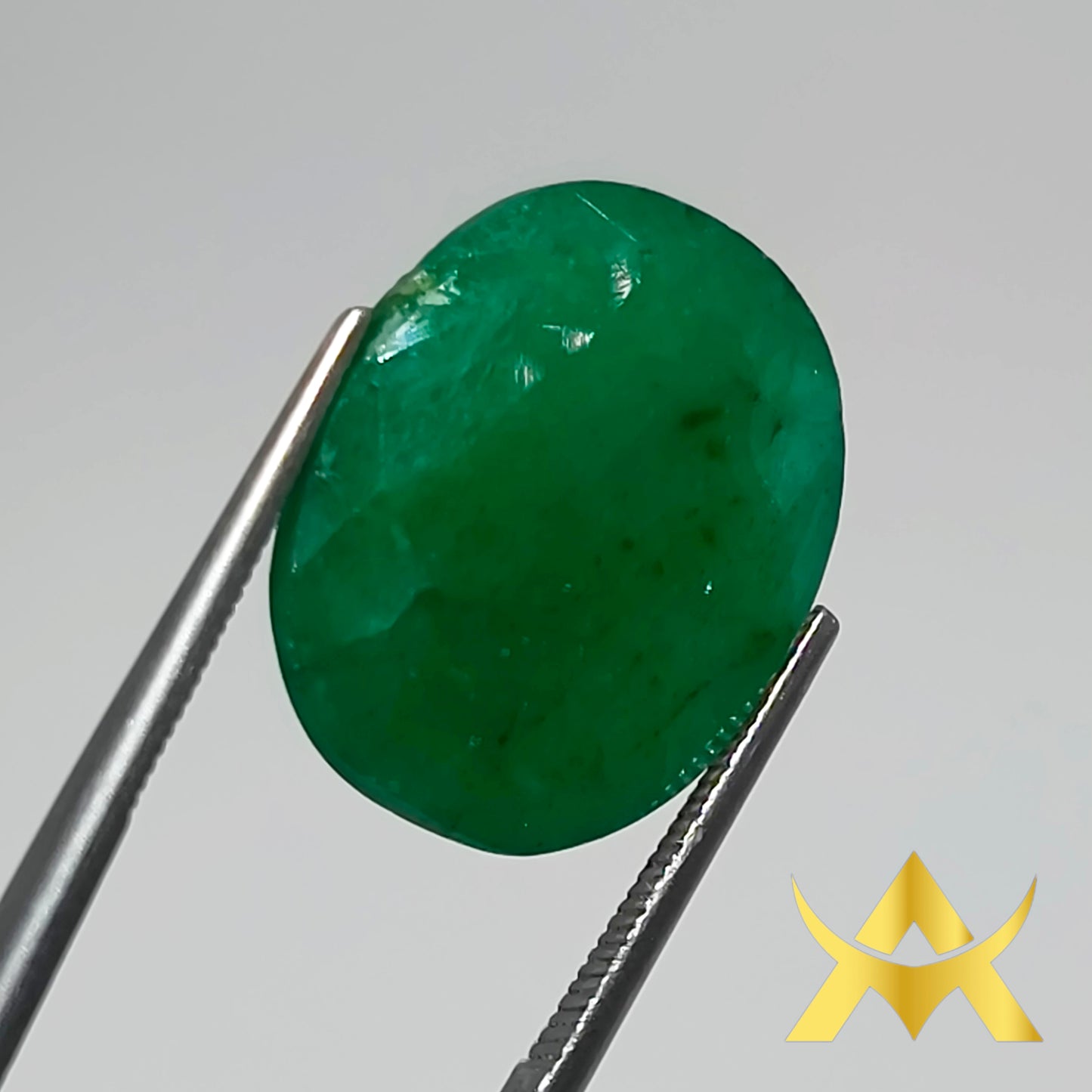 Natural Emerald 14.96 ct. Not Enhanced, Semi Translucent with Excellent Cut Grade