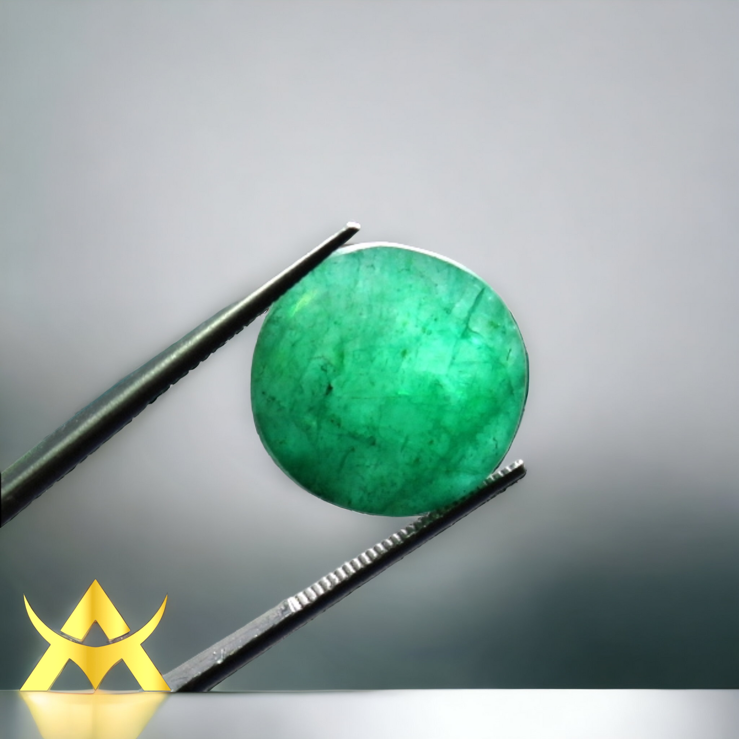 Natural Brazil Emerald 11.74 ct. Round facetted, not enhanced with Opaque Quality