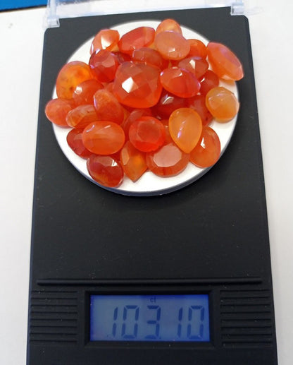 Carnelian 103.10 ct. Lot not enhanced with very Good Cut Grade and SI - Translucent Transparency