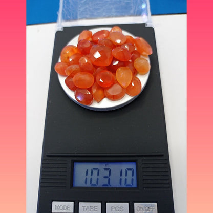 Carnelian 103.10 ct. Lot not enhanced with very Good Cut Grade and SI - Translucent Transparency